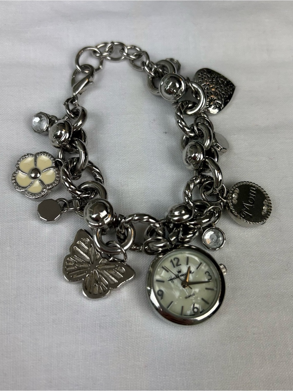 Hallmark Silver-Tone “Mom” Charm Bracelet Watch with Cream Flower